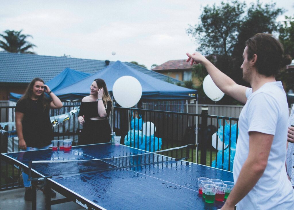 An image of people playing a fun game at a party.