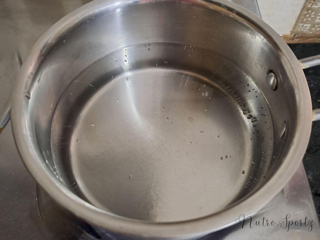 An image of water boiling in a pan.