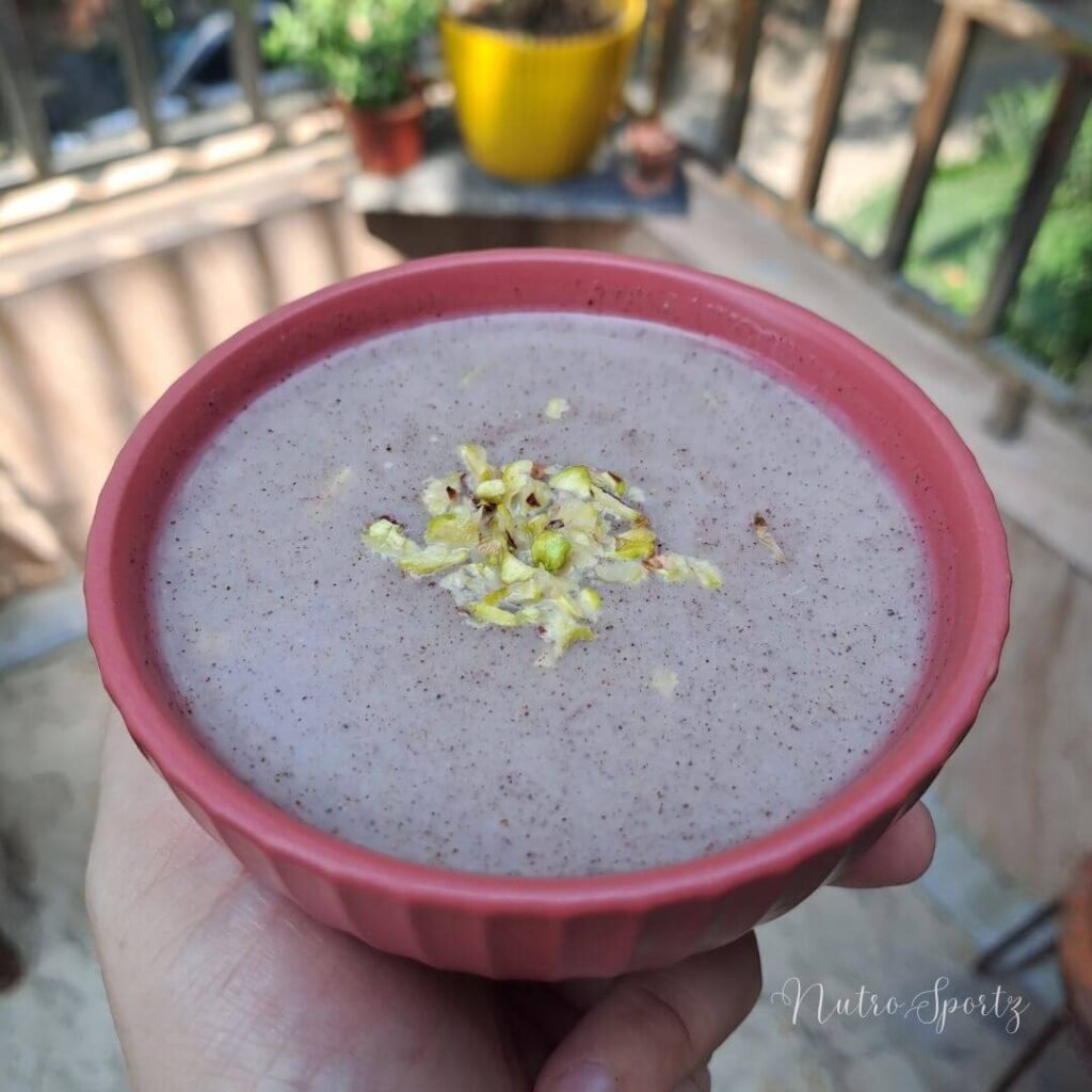 An image of ragi malt/ ragi porridge in a bowl.