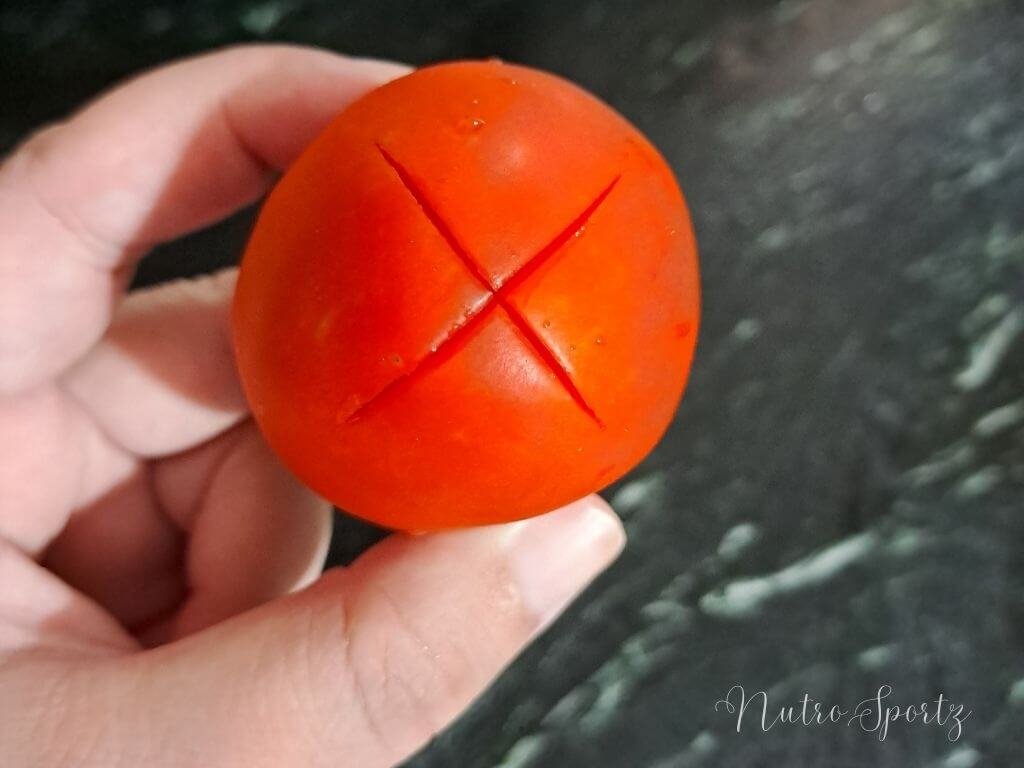 An image of a tomato with an "X" cut.