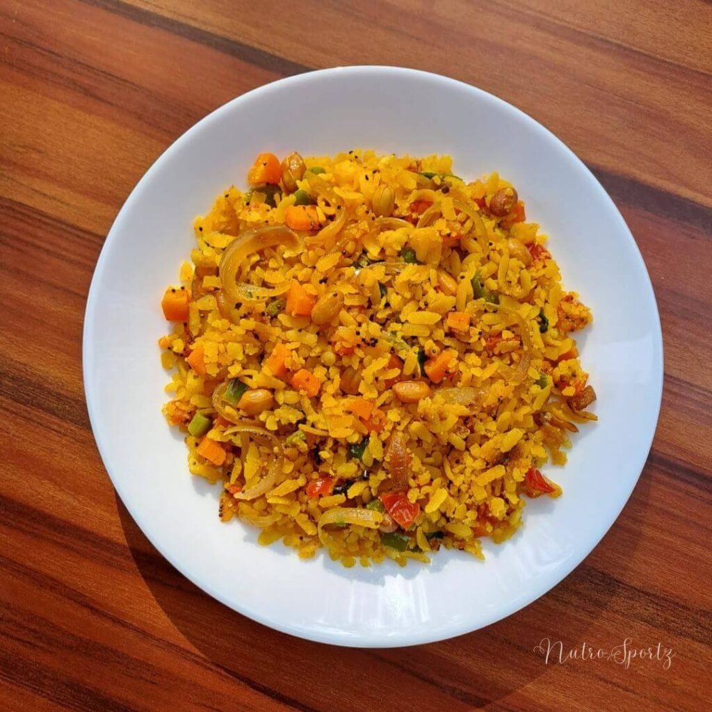 An image of vegetable poha on a plate.