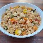 An image of suji upma recipe in a bowl.