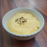 An image of mango greek yogurt in a bowl.